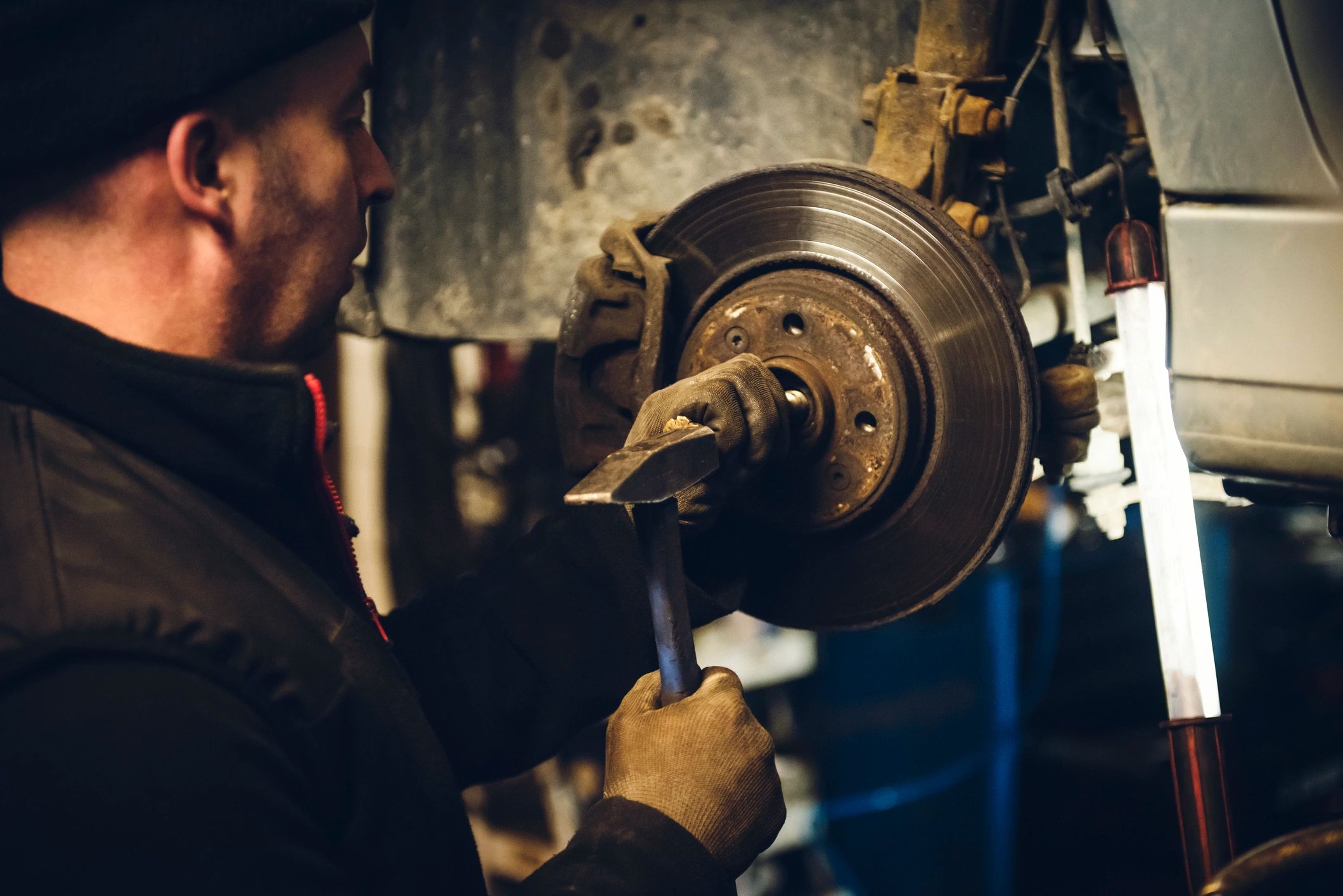Professional auto mechanic in a garage